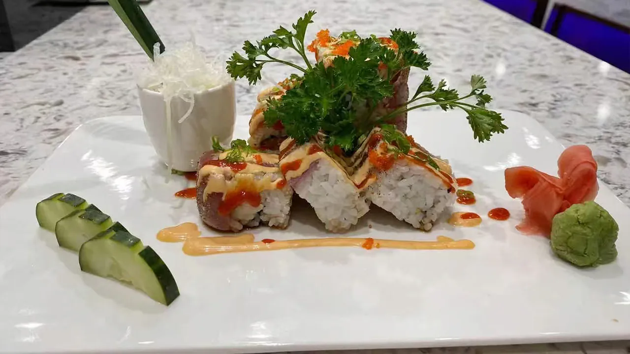 Stacked Tuna Roll with Sauce and Garnish at Rakisuta Modern Sushi, Japanese Restaurant in Rockledge