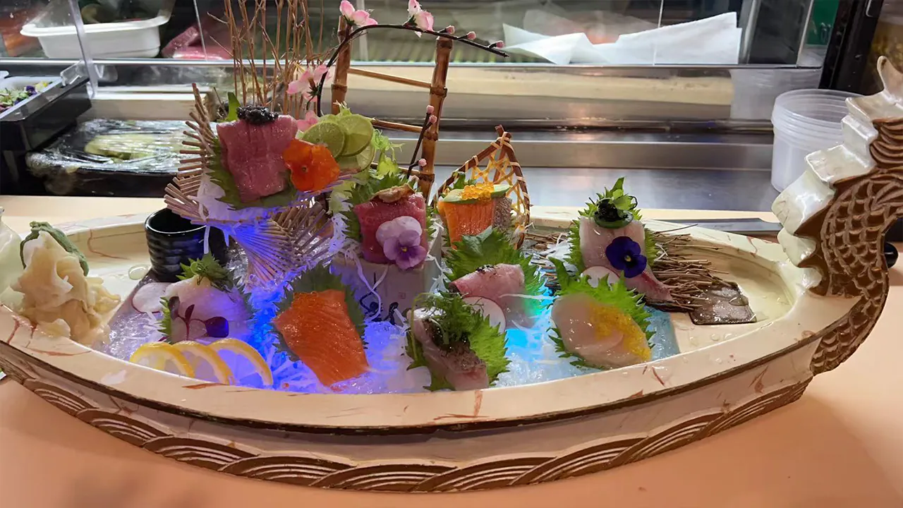 Dragon Head Sushi Boat with Illuminated Ice and Assorted Seafood at Rakisuta Modern Sushi, Japanese Restaurant in Rockledge