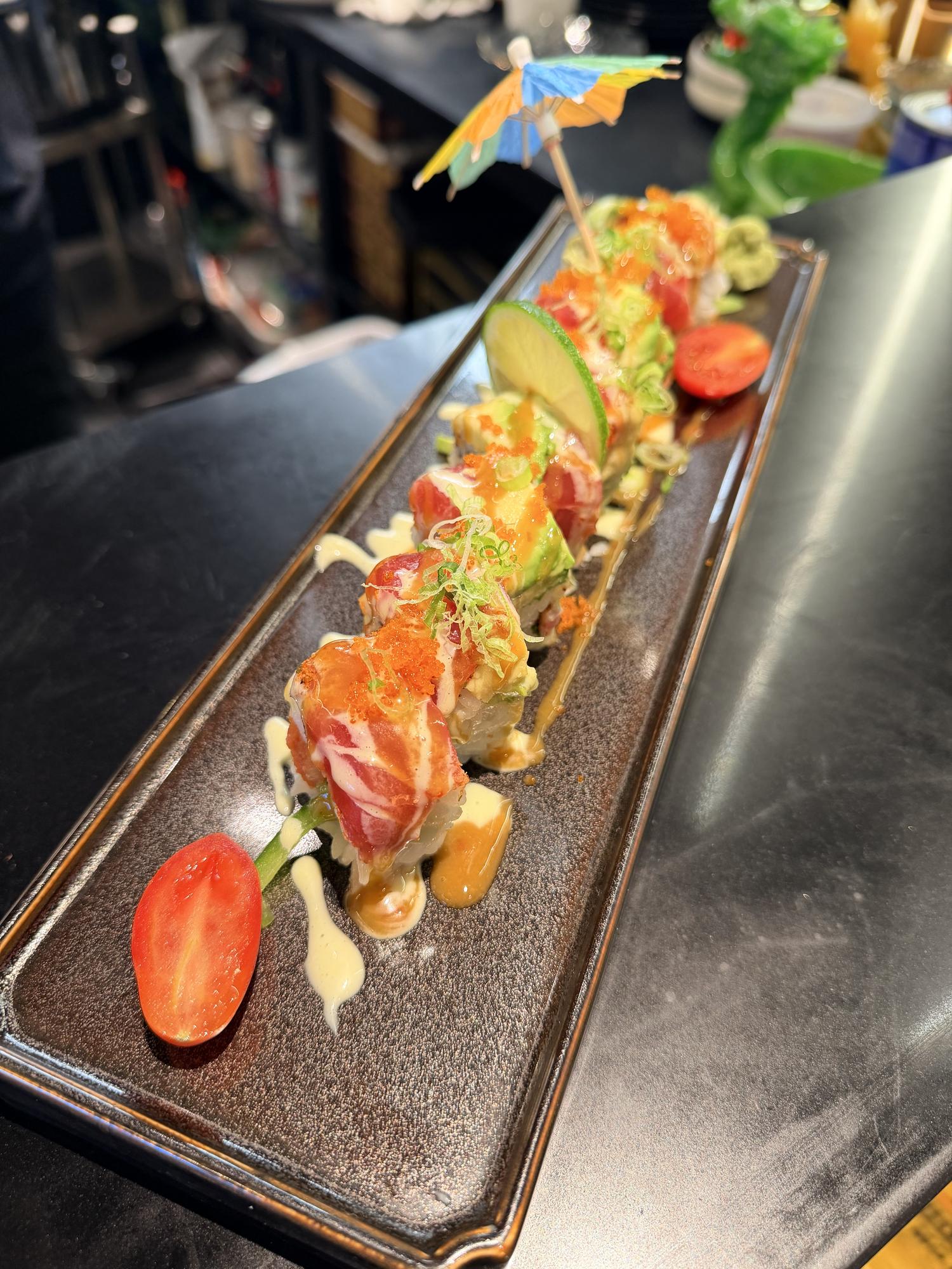 Signature tuna sushi roll with avocado and garnish at Rakisuta Modern Sushi, Japanese Restaurant in Rockledge
